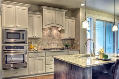 Sherwin Williams Snowbound Painted Cabinets Make The Kitchen Feel