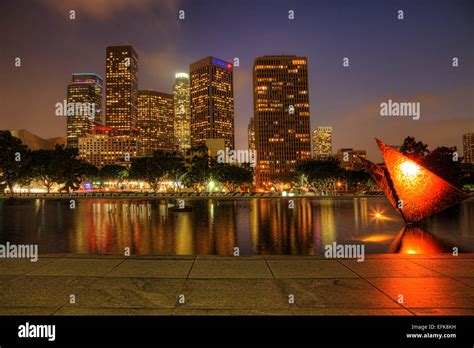 Los Angeles City Center With Reflecting Pool In The Foreground At Night