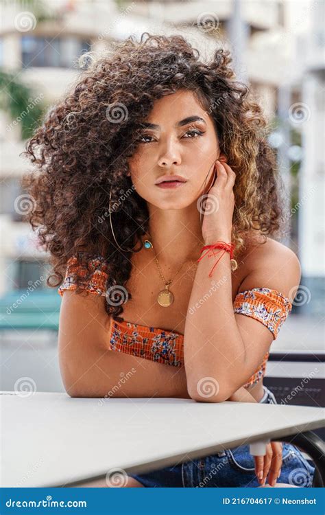 Beauty Portrait Of Attractive Colombian Woman With Afro Hairstyle And Delicate Makeup Stock