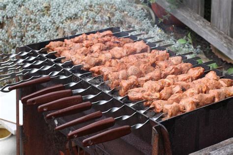View Of Meat Grilled In A Traditional Charcoal Grill Stock Image