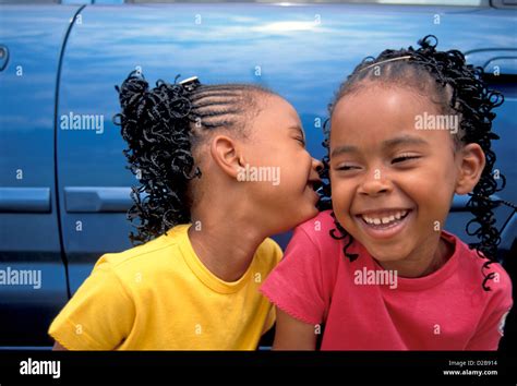 Twin Girls Laughing Stock Photo Alamy
