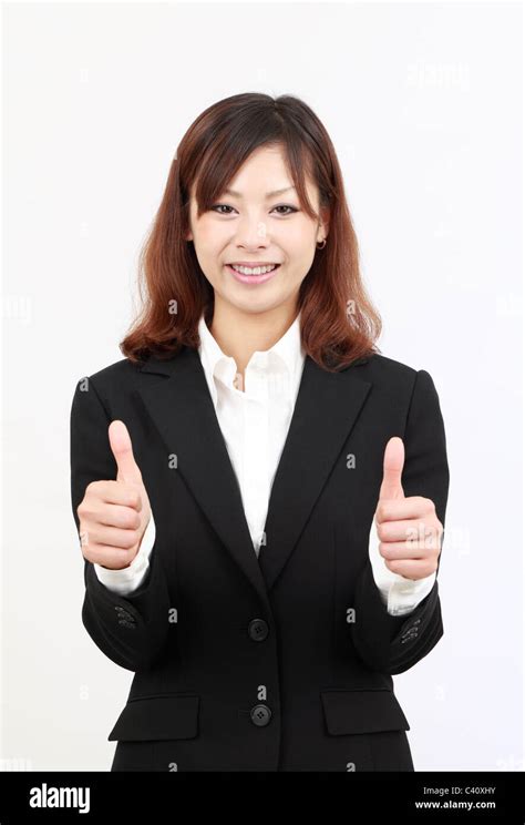 Smiling Asian Business Woman Showing Thumbs Up Gesture Stock Photo Alamy