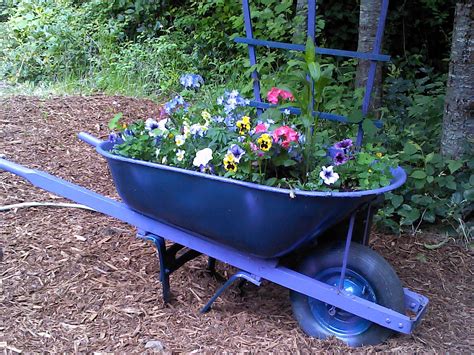 Pin By Linda Gene Brown On Garden Creations Wheelbarrow Wheelbarrow