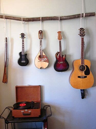 Displaying a guitar is a clear indication of the love a guitar owner has towards the instrument. Hanging instruments | Hang guitar on wall, Hanging guitars, Decor
