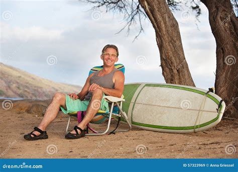 Smiling Man Sitting With Surfboard Stock Image Image Of Hawaii