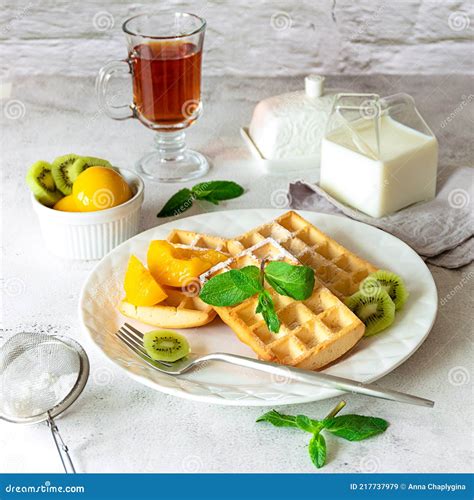 Fresh Belgian Waffles With Fruits Served For Breakfast Stock Image