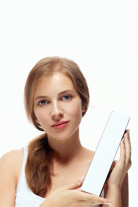 Beauty Face Of Woman Concept Skin Care Portrait Of Female Model Holding And Applying Cosmetic