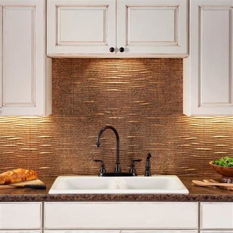 Back off from your work now and again to check that no tiles have moved and everything is in order. Fasade® Waves - 18" x 24" Vinyl Tile Backsplash in Cracked Copper at Menards®