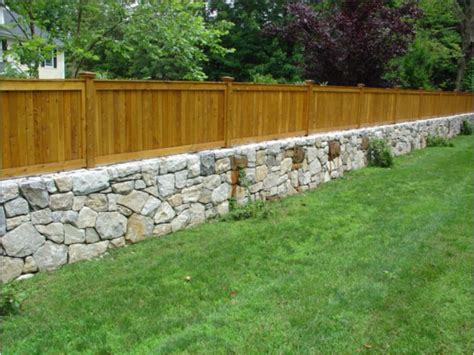 That way you get the classy look. Westchester granite fieldstone retaining wall with cedar ...