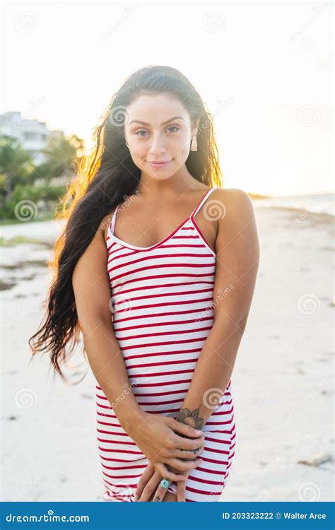 A Lovely Brunette Model Enjoys The Sunset While On Vacation In The YucatÃ¡n Peninsula Near