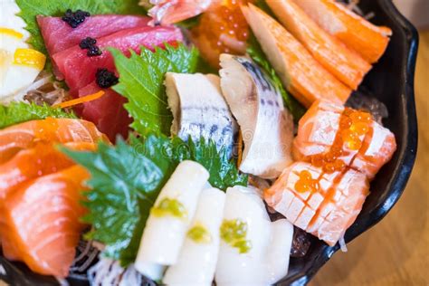 Fresh Sashimi Raw Fish Mixed In Traditional Japanese Style Stock Photo