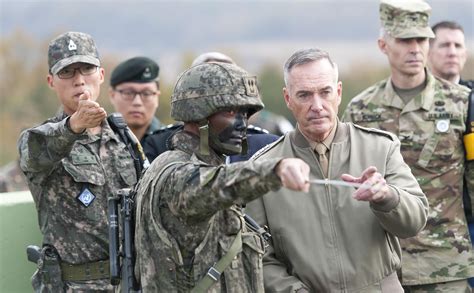 These sentences come from external sources and may not be accurate. Dunford Salutes U.S., South Korean Troops on DMZ Duty > U ...