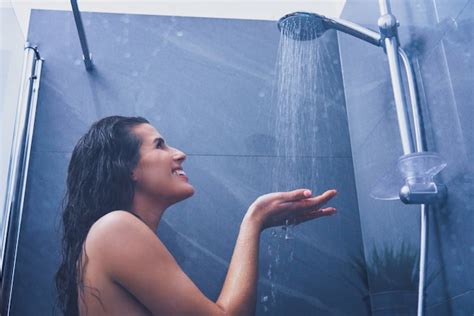 Premium Photo Adult Woman Under The Shower In Bathroom