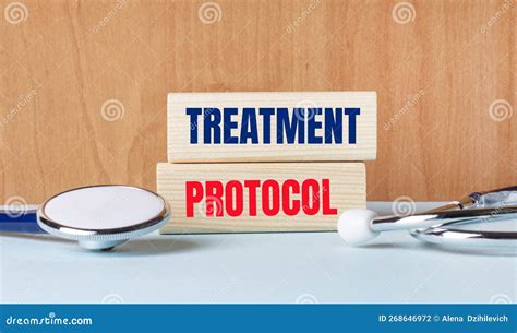 The Text Of The Treatment Protocol On Wooden Blocks And A Stethoscope