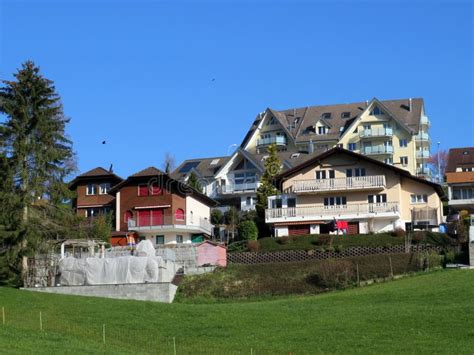 View Of The Small Picturesque And Modern Swiss Subalpine Settlement Of