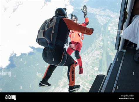 A Freestyle Skydiving Team Exiting From A Pilatus Porter For A Training
