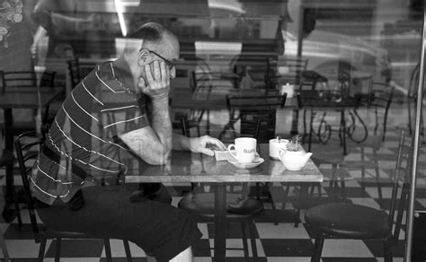 Man Sitting Alone In A Cafe In Melbourne Moodboard