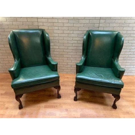 Rolled arms are thick and plush. Hancock and Moore Green Leather Wingback Chairs and ...