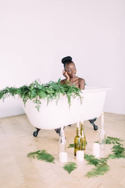 Premium Photo Woman Bathing In A Tub Full Of Foam Beautiful African American Bride In