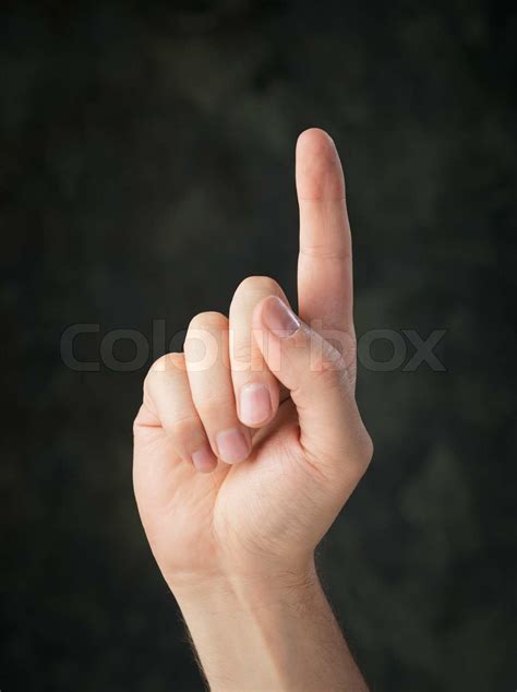 Hand Pointing Up With An Index Finger Stock Image Colourbox