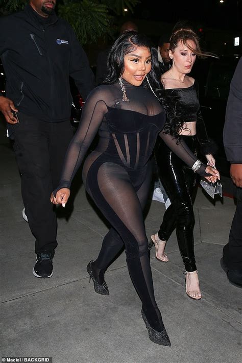 Lil Kim 48 Puts On A Voluptuous Display In A Sheer Black Catsuit As She Arrives At Grammys