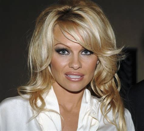 pamela anderson 50 shows off her curves in a silk gown in a recent public outing