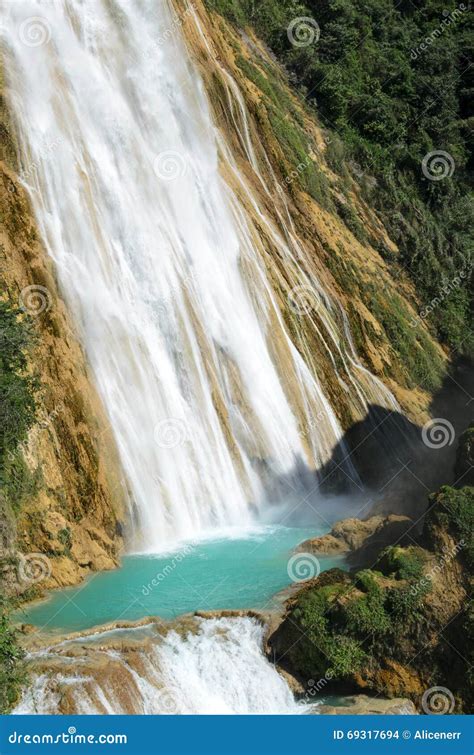 Two Cascades Of El Chiflong Waterfall With Turquoise Pool Between Them