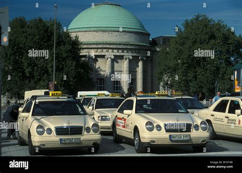 Taxis At The Main Station In Hamburg In The Background The Art Gallery