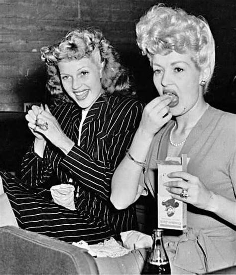 a candid of rita hayworth and betty grable 1943 r oldhollywood