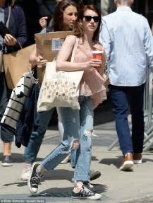 Emma Roberts Dons Ripped Denim And Pleated Blouse In Nyc Daily Mail