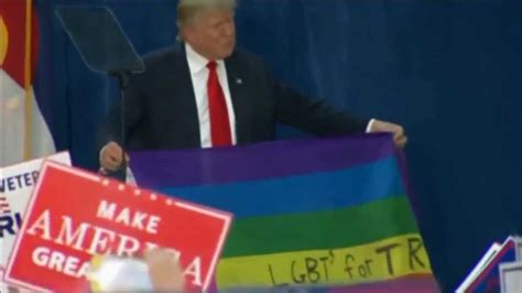 Trump Holds Up Rainbow Lgbt For Trump Flag At Colorado Campaign Rally Christian News Network