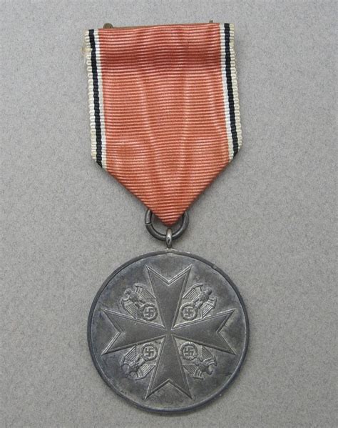 German Eagle Order Medal In Silver With Swords By The Berlin Mint