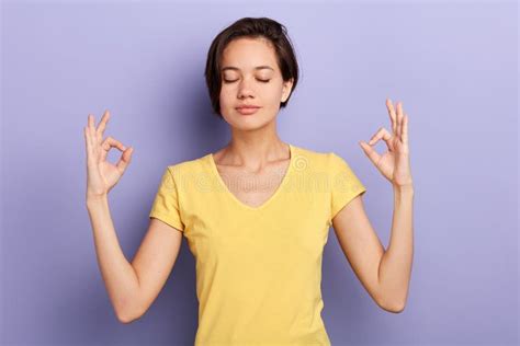 Relaxed Careless Girl Makes Mudra Sign Relaxes After Hard Working Day