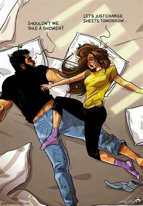 A Man And Woman Laying In Bed With Their Arms Around Each Other As If They Were Fighting