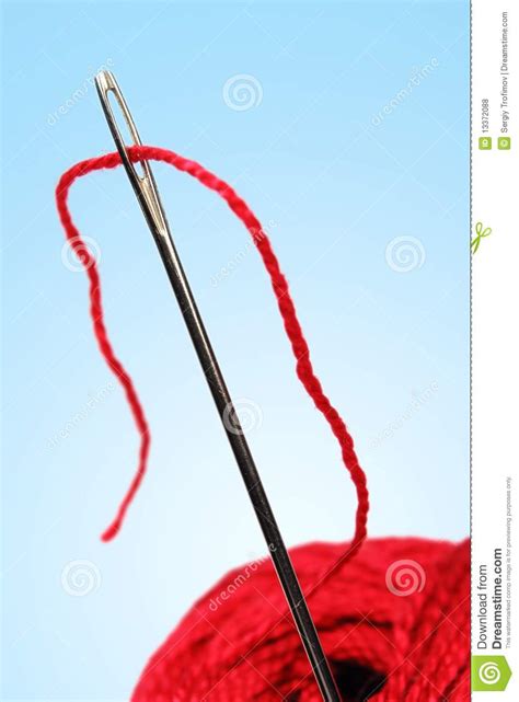 Clew And Needle With Red Thread Stock Photo Image Of String Objects