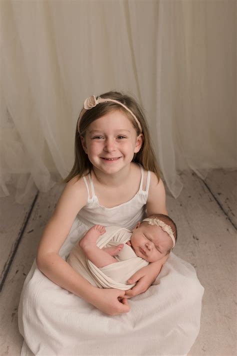 Classic Newborn With Big Sister Portraits Greenville Scnatural