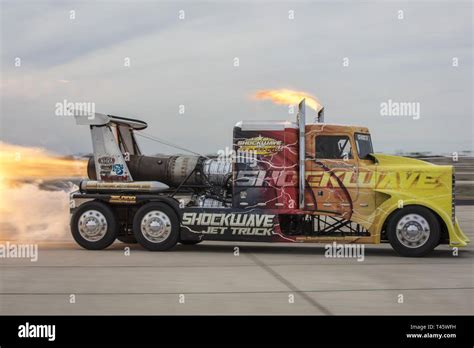 Chris Darnell, driver of the Shockwave Jet Truck, drives down the