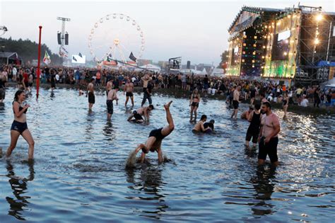 Polandrock Festival Topless And Bikini Clad Women Frolic In Mud At