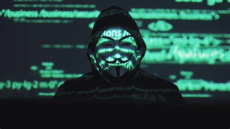 Anonymous In The Mask Steals User Data On The Network Stock Footage