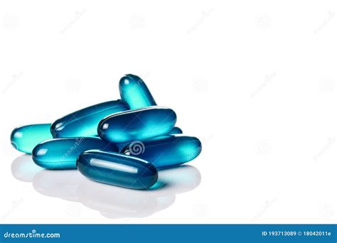 Close Up Of Blue Soft Gel Capsules Isolated On The White Background