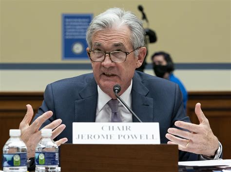 Fed Chair Touts Much Improved Economy 1 Year After Stocks Hit