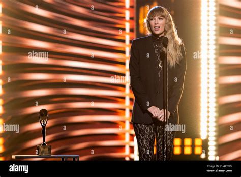 Taylor Swift Presents To Carole King During The Rock And Roll Hall Of