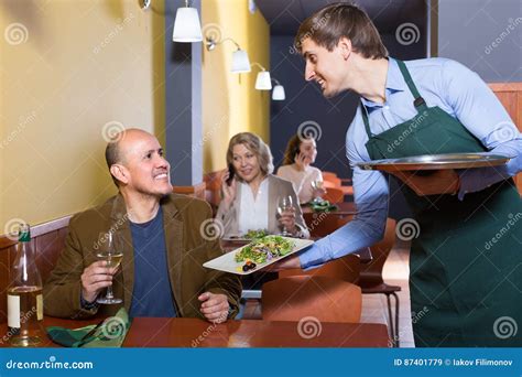 Waiter And Mature Man In Restaurant Stock Image Image Of Person Male 87401779