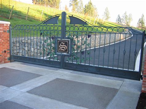 Driveway Gate With Custom Ornamental Pieces By Stratford Gate Systems