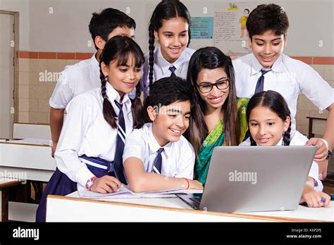 Indian School Students And Teacher Laptop Studying E Learning In Stock