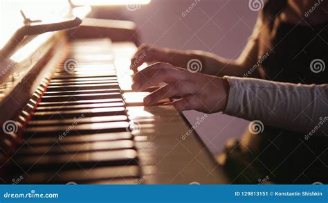 Child Playing Piano Close Up On Piano Keys Child Hands And Fingers