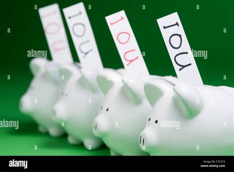 Piggy Banks Ious Coming Out Hi Res Stock Photography And Images Alamy