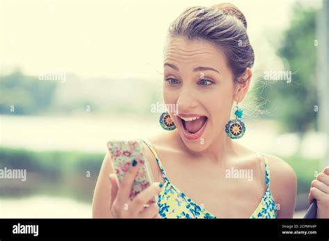 Closeup Portrait Surprised Screaming Young Girl Looking At Phone Seeing