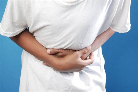 Young Man Suffering Stomach Pain Close Up Stock Photo Image Of