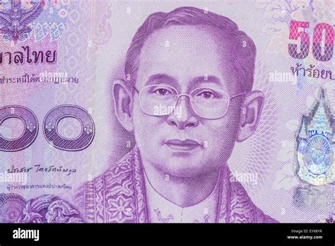 Close Up Of Thailand Currency Thai Baht With The Images Of Thailand